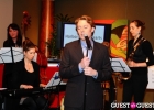 Performing with Clay Aiken at a benefit concert.